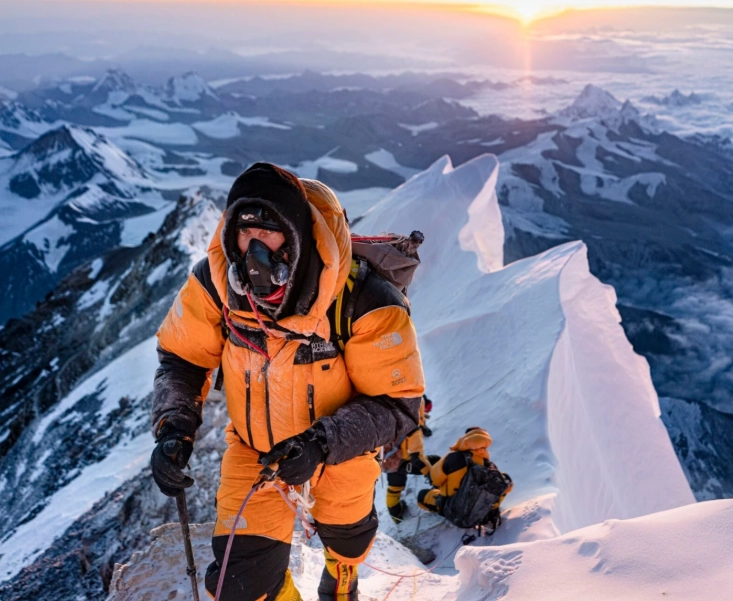 Why do climbers wear helmets?