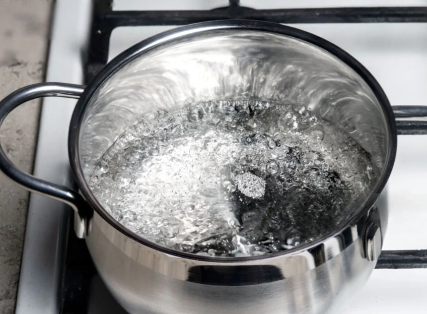 What is the safest method to purify water at home?